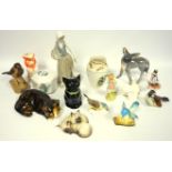 Group of figures of animals and birds, Winstanley cat, Wedgwood donkey, Crown Staffordshire Tom Tit,