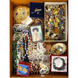 A large quantity of vintage costume jewellery, earrings, necklaces, enamel bird broach, and a London