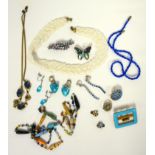 A group of costume jewellery, 1940's enamel paste and gilt metal necklace, another Venetian glass,