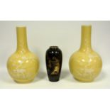 A pair of Yellow glazed vases, overlaid with white decoration of birds and blossom, character mark