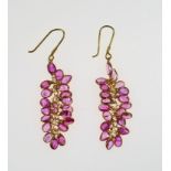 Pink sapphire earrings, the multi stone drops set with oval faceted stones in 14 ct yellow gold,