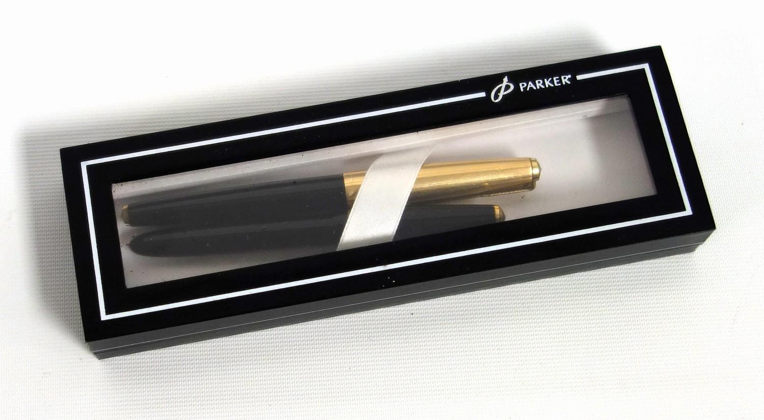 Parker 61 pen with gold plated top, and another fountain pen unmarked, with Parker box