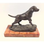 Bronze figure of a Labrador gun dog on red marble base, 20 th C, height 16 cm