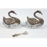 A pair of silver and crystal swan salts, H. 7cm, L. 7cm, Wingspan 9cm, with a silver salt spoon, the