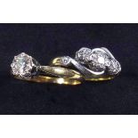 An illusion set three stone diamond ring on 18 ct band, size H and similar single stone ring size K