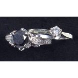 White gold ring set with black diamond and diamond set mount and shoulders, ring size K 1/2 and a