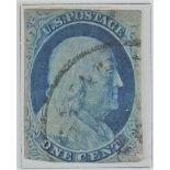 Benjamin Franklin 1 cent stamp, other early United States of America postage stamps contained in a