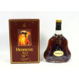 Hennessy XO vintage cognac, 70cl, 40% vol, vine decorated bottle, in red carton, old labelling