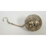 Chinese white metal pierced diffuser or tea ball, circular hinged form with incised and pierced