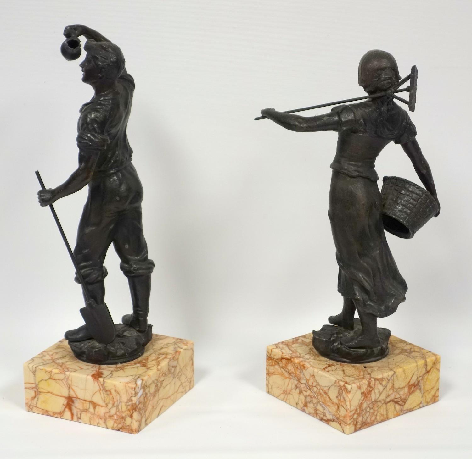 A pair of 19th C. French spelter figures, the girl carrying a basket of fruit, the boy holding a - Image 2 of 4