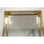 Deknudt Belgian wall mirror with a bevelled rectangular plate in a gilt moulded frame 139 x 50 cm
