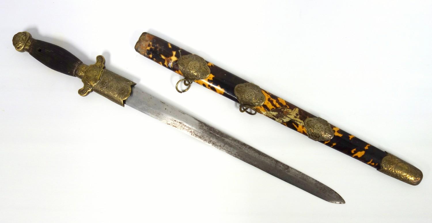 Chinese short sword, steel blade in tortoiseshell scabbard, the brass mounts engraved with symbols