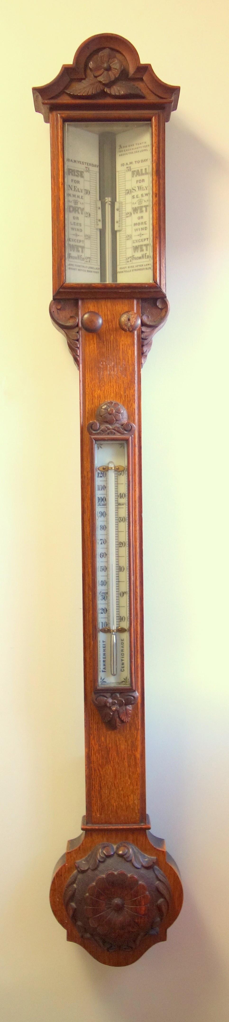 Victorian oak stick barometer, mercury filled concealed tube, un-named ivory coloured tablets with