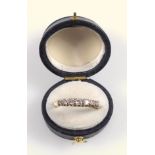 Diamond line ring, set with seven brilliant cut diamonds, estimated total diamond weight 0.60