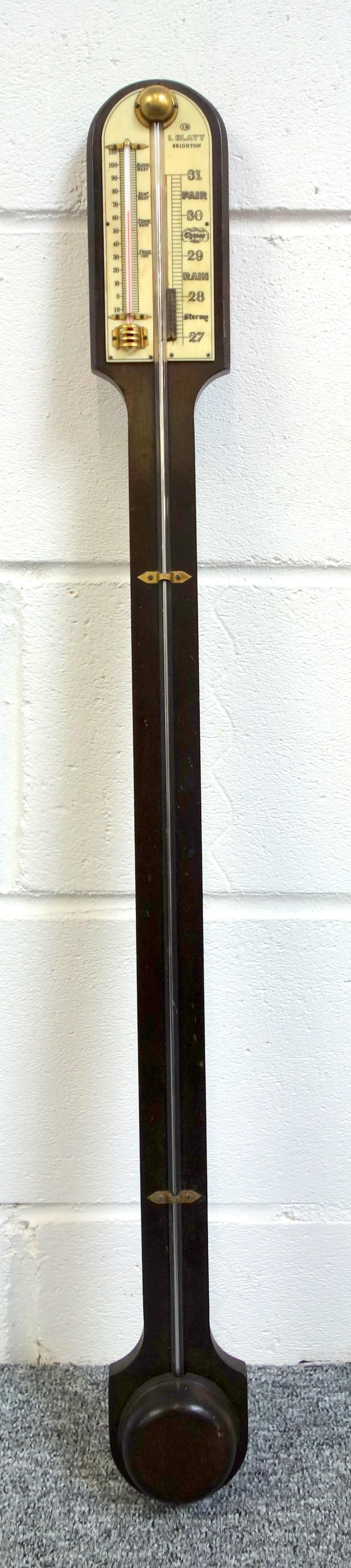 A stick barometer by Blatt of Brighton Mahogany stick barometer with visible mercury tube and