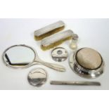 Silver four piece toilet set with engine turned decoration, comprising a hand mirror, pair of