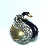 Diamond and enamel swan brooch in 18ct gold, white and black swans together