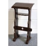 An Arts & Crafts reading/music stand, with pierced quatrefoil decoration and label for R & T