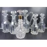 William IV period decanter and claret jug set of lobed form with triple ring necks, two decanters of