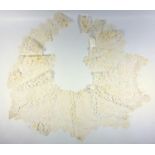 A good Honiton lace shawl collar, 19th C. design of briar roses, the dentil edge with leaves and
