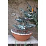 A metal leaf fountain painted with Verdigris finish