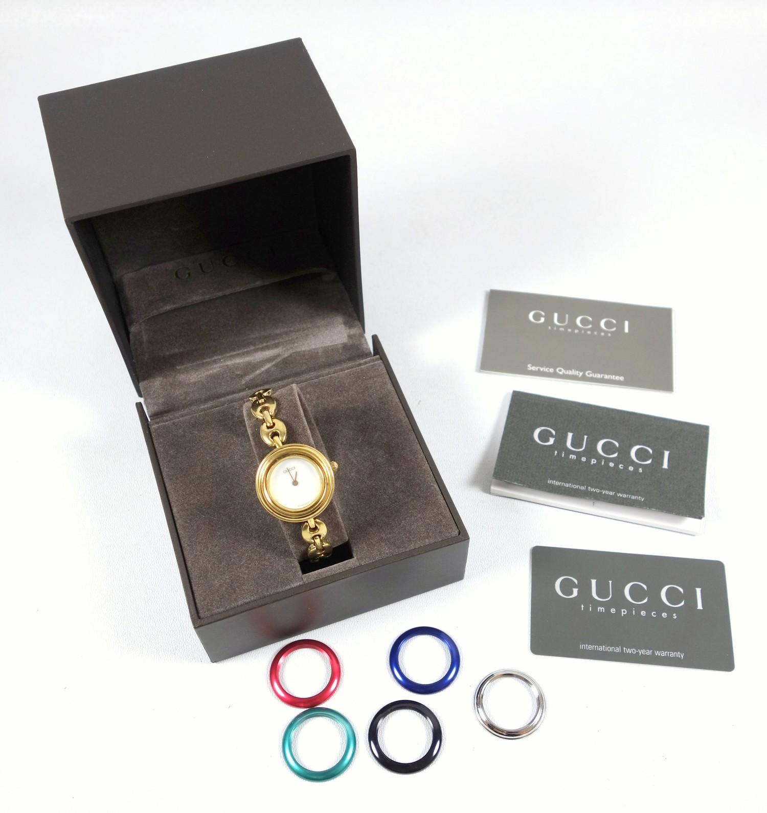 Gucci watch with interchangable bands