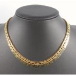 Yellow gold Cleopatra style necklace of articulated square sections, 9 ct, length 42 cm, 19 grams