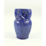 Harris Pottery Farnham, an owl jug ,blue glazed, with incised decoration and pronounced beak,