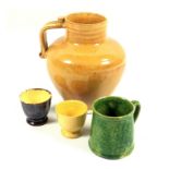 Harris Pottery Farnham, a small green glazed tankard incised HAC, two egg cups with stamped marks