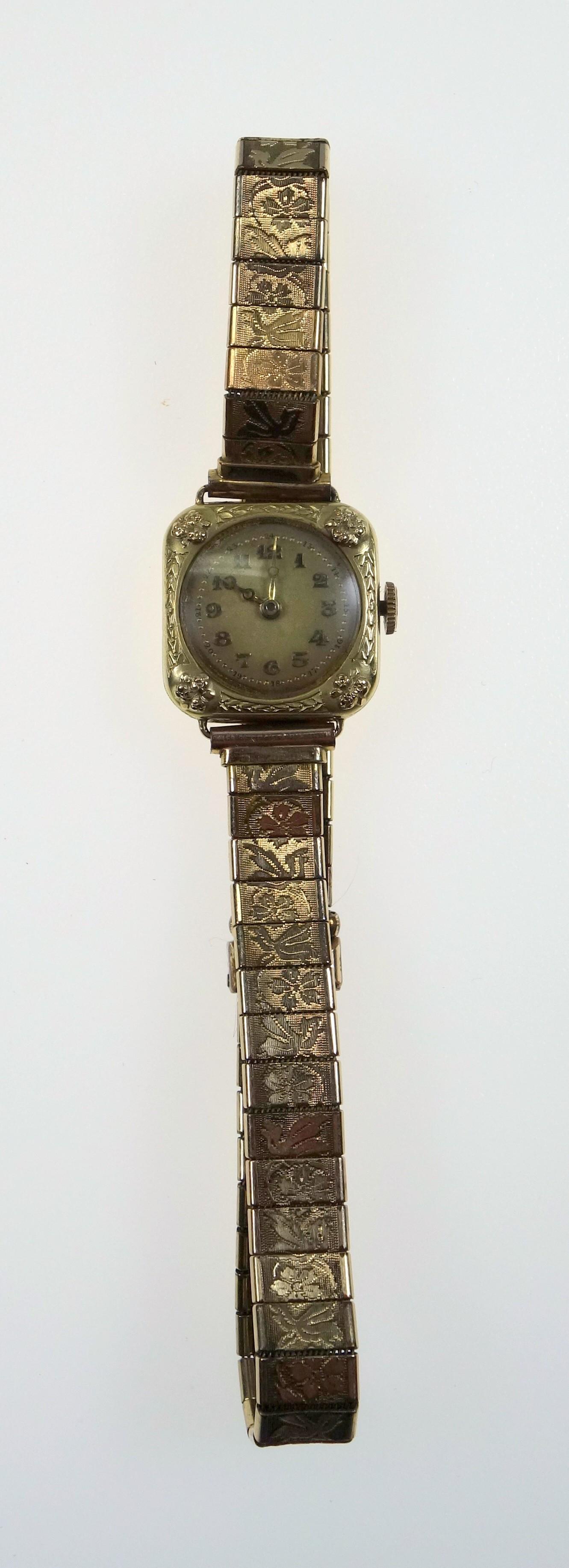 Edwardian ladies gold watch, the case with raised floral decoration and engraved sides, 14 ct, on - Image 2 of 4