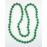 Green jade bead necklace length 80 cm, bead size 1.2 cm.
