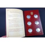 Churchill Centenary Trust album containing a set of 24 silver proof medals commemorating Winston