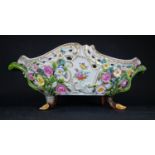 Late Meissen, a pair of porcelain baskets, with naturalistic branch feet and handles, pierced and