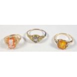 Edwardian period American ring, set with a cameo, engraved shoulders, marked 10 ct gold, a citrine