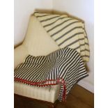 Two early 20th C. Welsh narrow width blankets, one heavyweight reversible cream & black with red