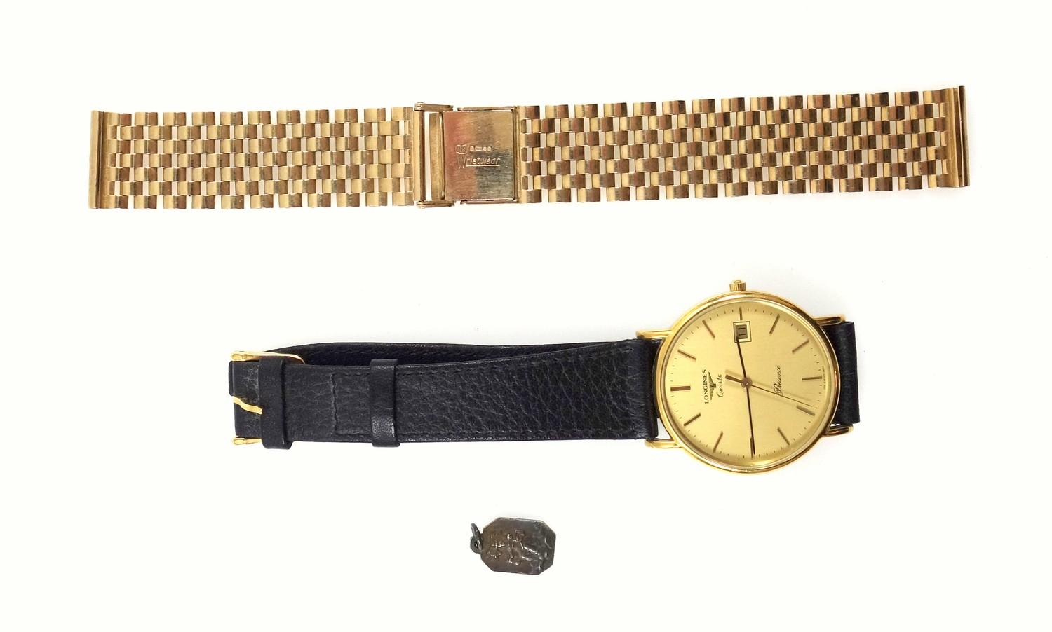 Longines, gold plated presence watch with quartz movement on leather strap and a 9 ct gold brick