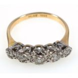 Illusion set diamond ring, the five brilliant cut stones set in platinum and 18 ct gold ring size