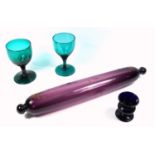 19th C. coloured glass, an amethyst glass rolling pin, 40 cm, a campana form Bristol glass egg cup