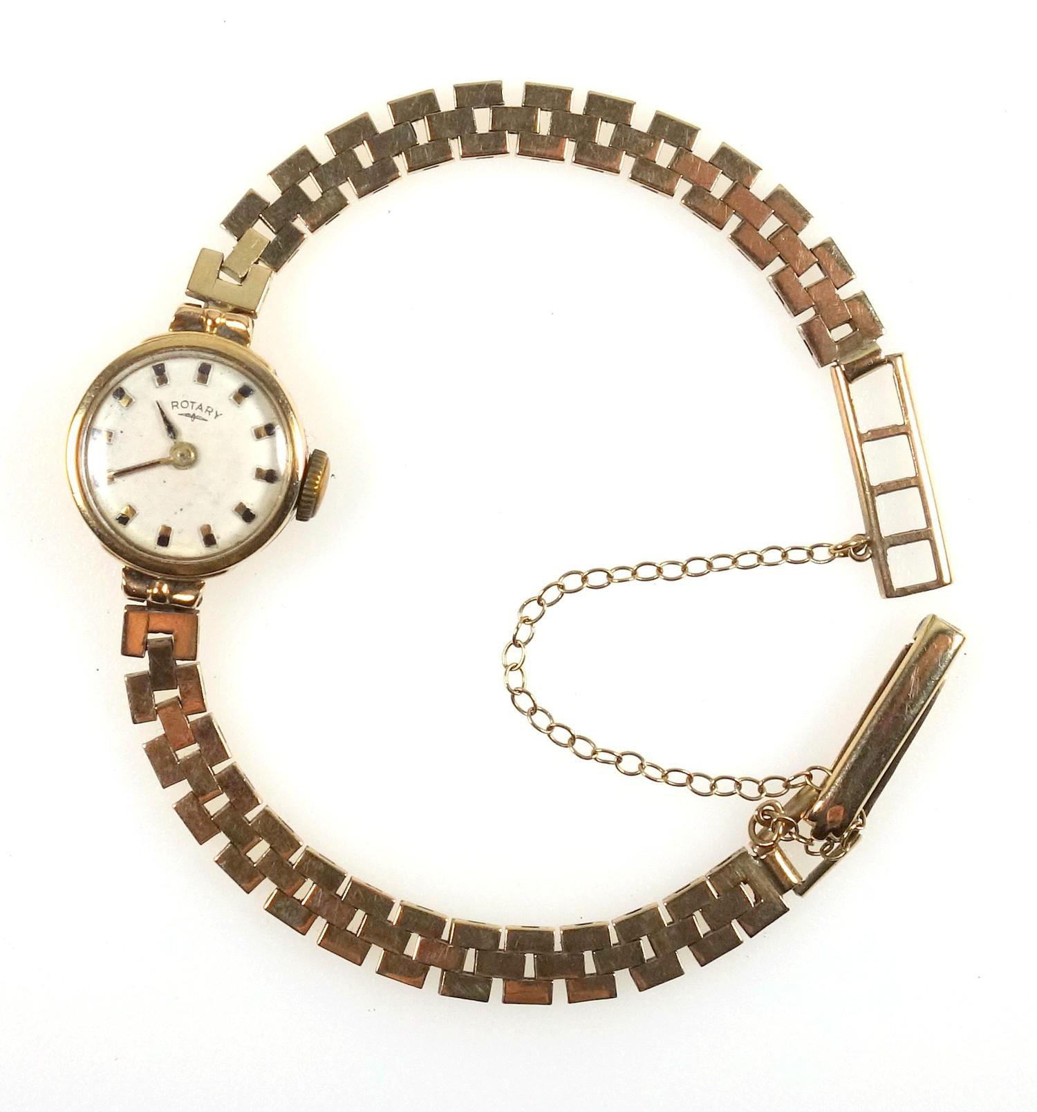 Rotary gold lady's watch on integral gold bracelet strap, gross weight 13 grams.