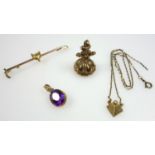Edwardian amethyst set pendant, a fob with glass intaglio depicting Victoria, a pendant with small