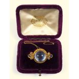 Victorian gold moonstone brooch with Royal provenance, cabochon moonstone set in a rope border