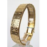 Vintage gold panel bracelet by Unoaerre, Arezzo, Italy with diamond form engraved decoration and