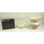 Group of Welsh items, a carved slate door stop, jug with hand painted decoration 21 cm and another