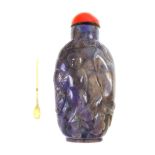 Chinese bolder opal snuff bottle, well carved example depicting a maiden in a garden, red agate top,