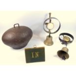 Two Victorian shop bells with wall fittings, a leather sign with gilt tooled IN/OUT, large cow