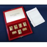 Set of seven silver gilt replica stamps commemorating the 25th anniversary of the Coronation of
