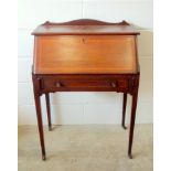 Edwardian inlaid mahogany bureau with a galleried back, fall front disclosing a fitted interior,