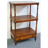 Victorian walnut 3 tier whatnot with a drawer below, on turned columns, tapering feet and castors, W