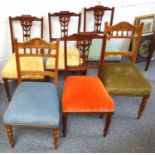 Set of four Edwardian carved walnut chairs with harlequin upholstered seats and two other chairs (6)