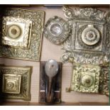 Four Victorian brass inkwells, a glass well and a letter punch (6)